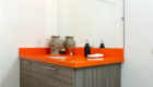 Kitchen sink with orange countertop