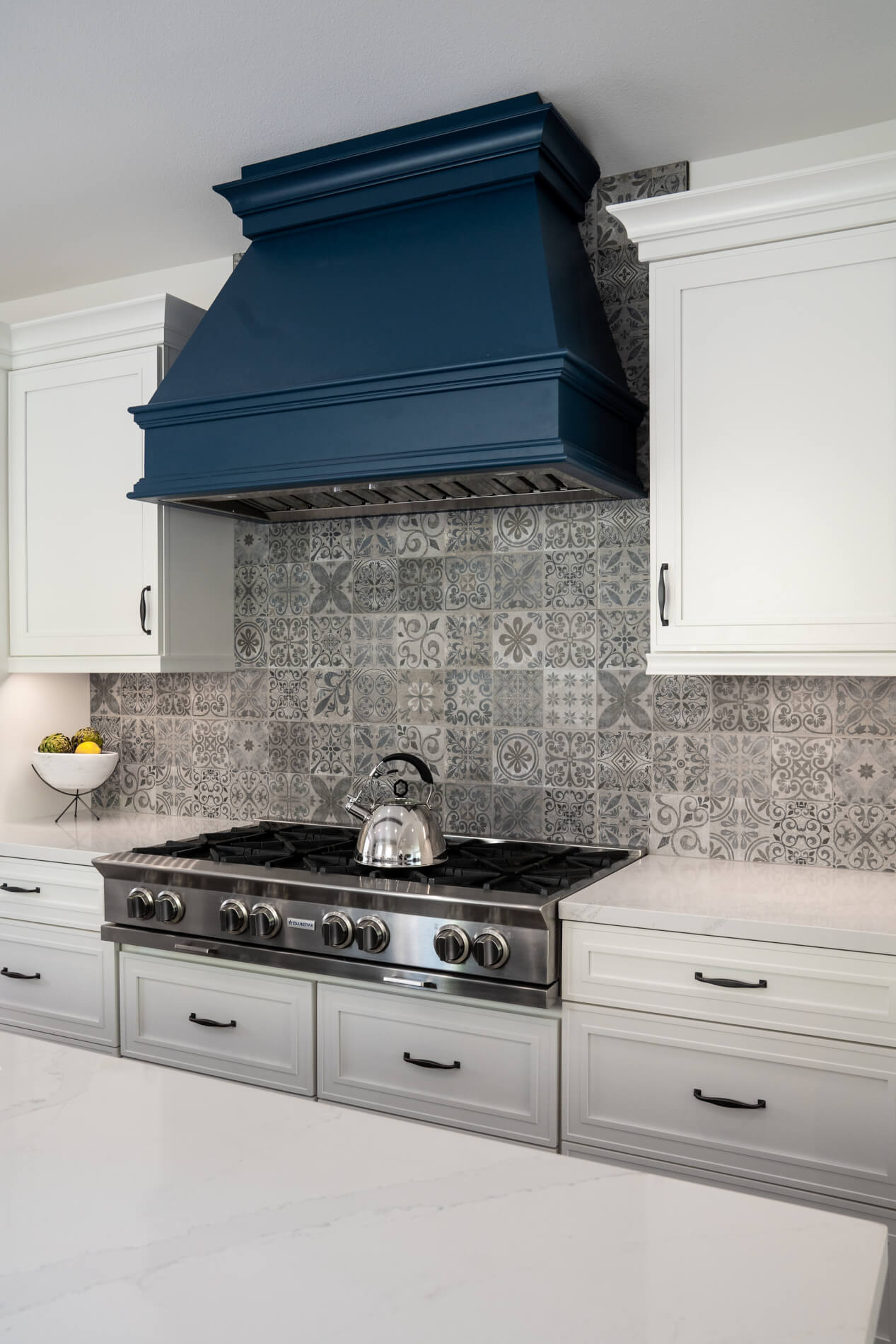 Cooking stove and chimney in kitchen remodel