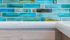 Beach themed glass tile backsplash in Capistrano Beach bathroom remodel