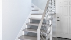 Staircase in Capistrano Beach whole home remodel