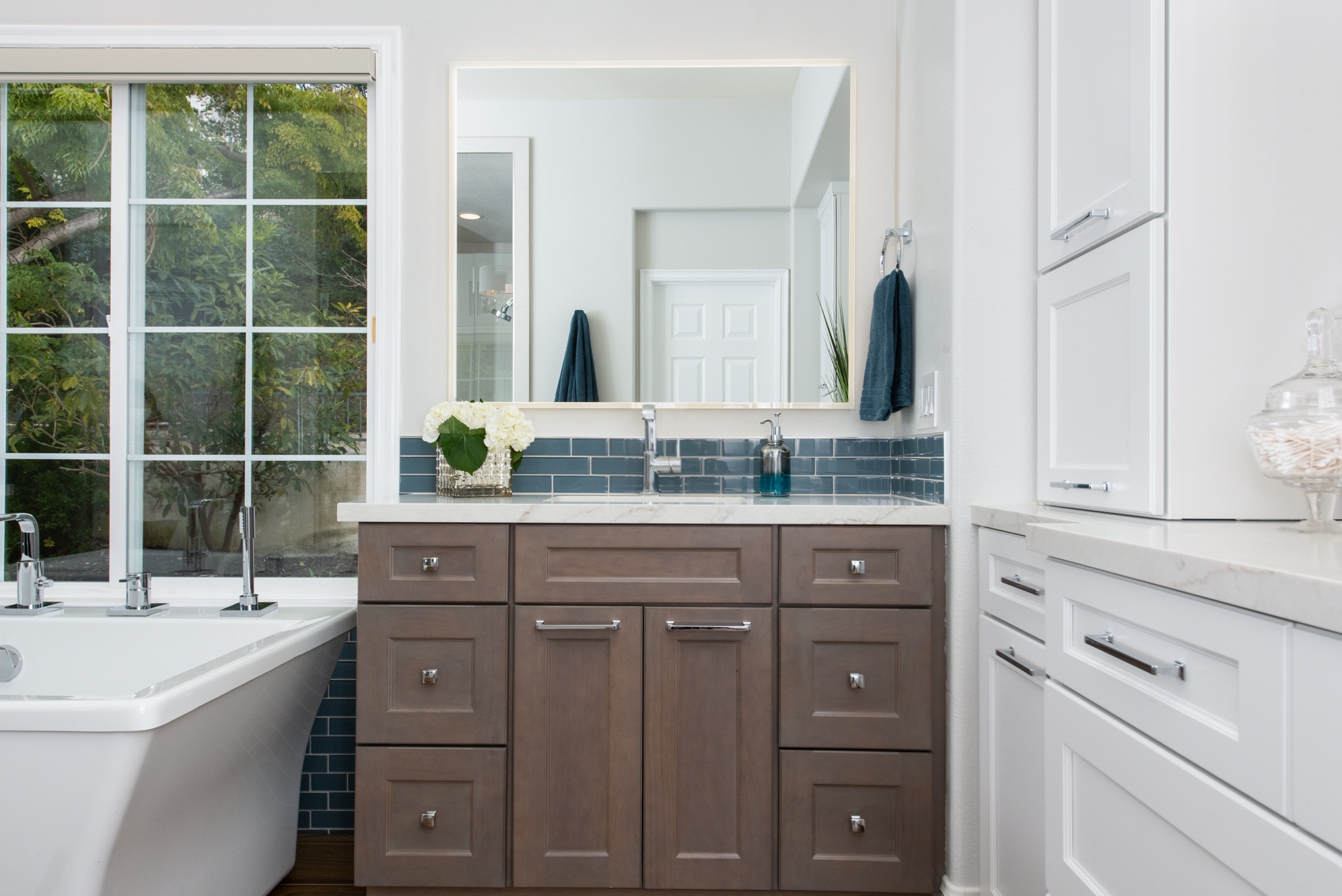 Blue-shining-glass-backsplash-tile-design-in-Rancho-Santa-Margarita-master-bathroom-remodel - smart bathroom trends
