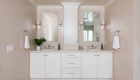White-cabinetry-with-glossy-blue-porcelain-backsplash-in-Laguna-Beach-kitchen-renovation