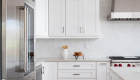 white-Irvine-kitchen-remodel-with-marble-backsplash-tile