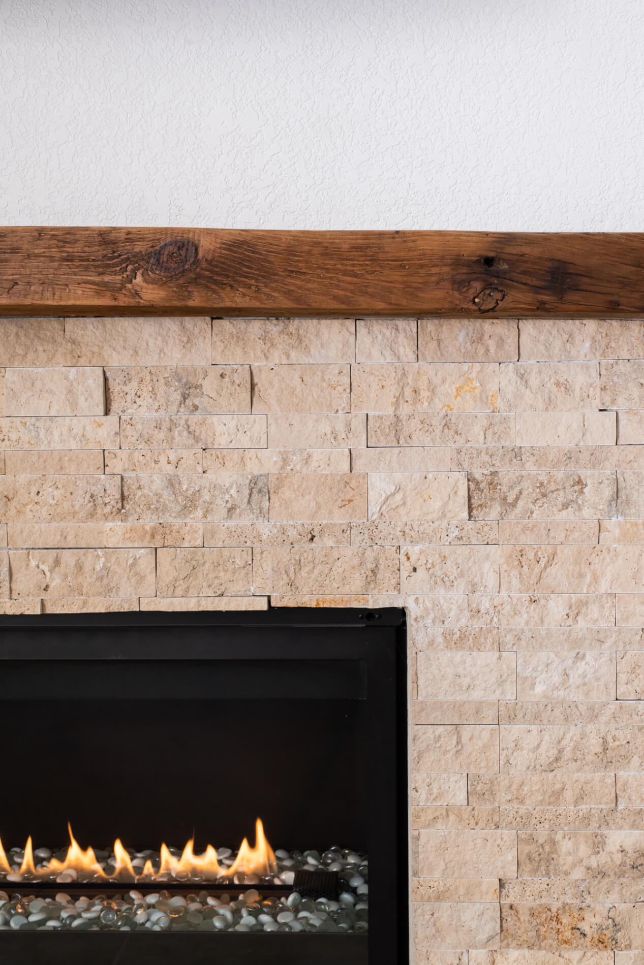 Stacked stone fireplace remodel