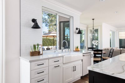 Laguna Niguel kitchen remodel with white cabinets and black kitchen hardware