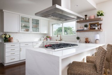 Kitchen peninsula with seating area and range - what to know before you start remodeling