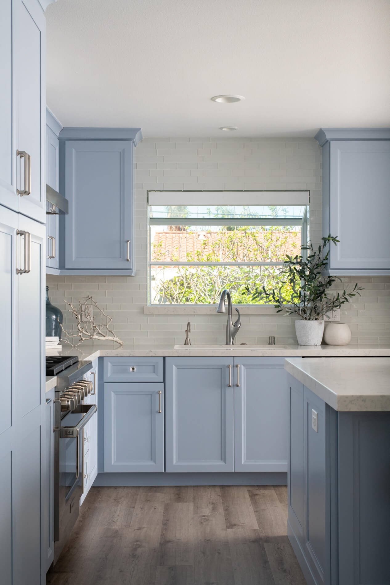 Baby Blue kitchen cabinetry in remodel