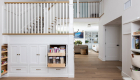 Custom pantry storage built-in staircase in home remodel