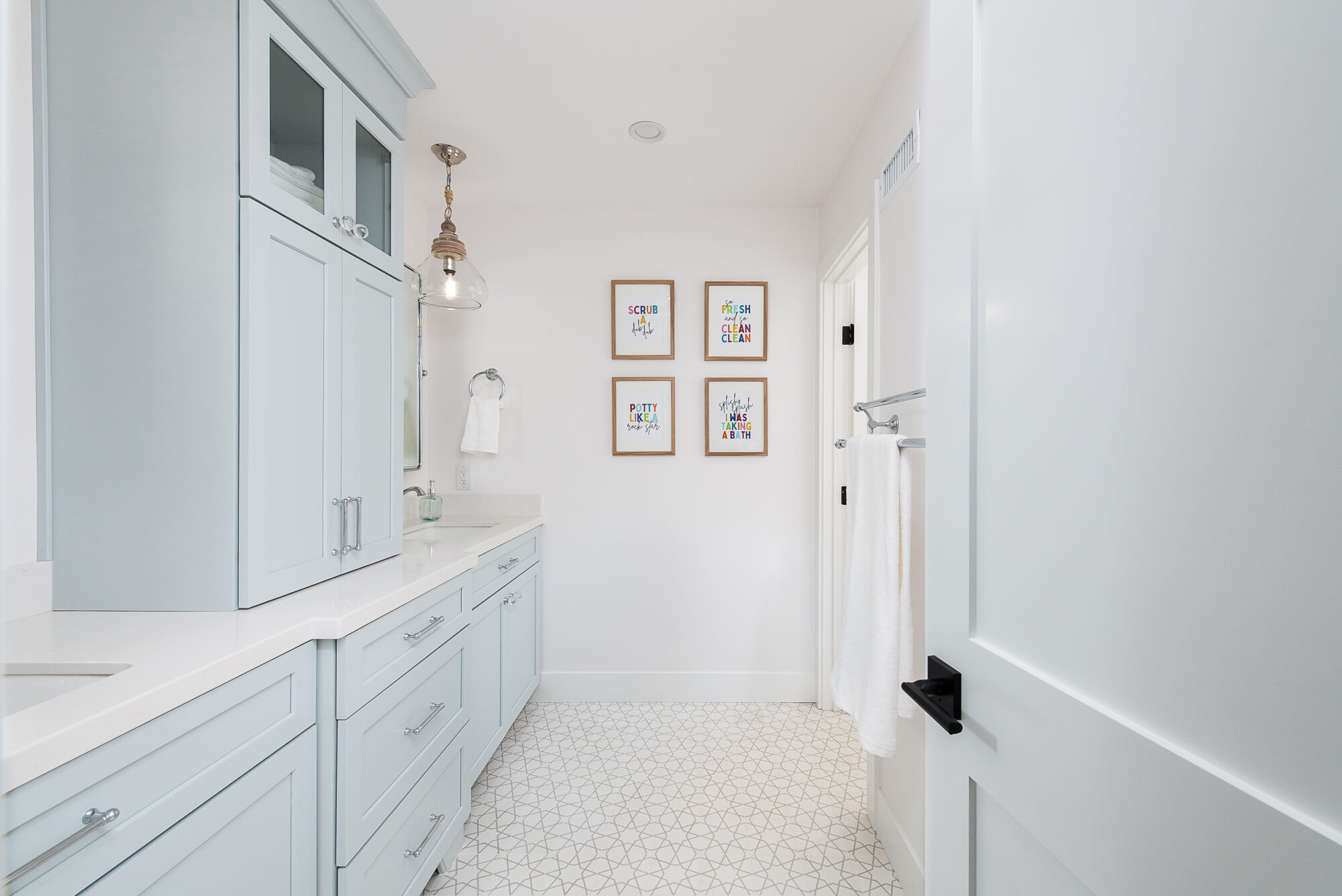 Geometric floor tile in kids' bathroom remodel - How To Choose The Right Flooring