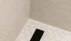 linear-shower-drain-porcelain-geostone-tile-flooring