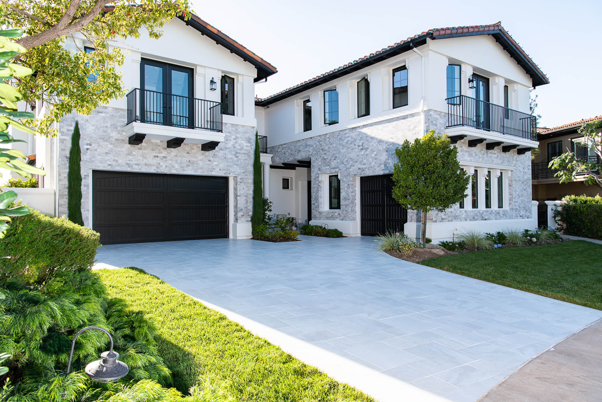 new-driveway-in-porcelain-pavers-versailles-pattern - Home renovations that actually pay off