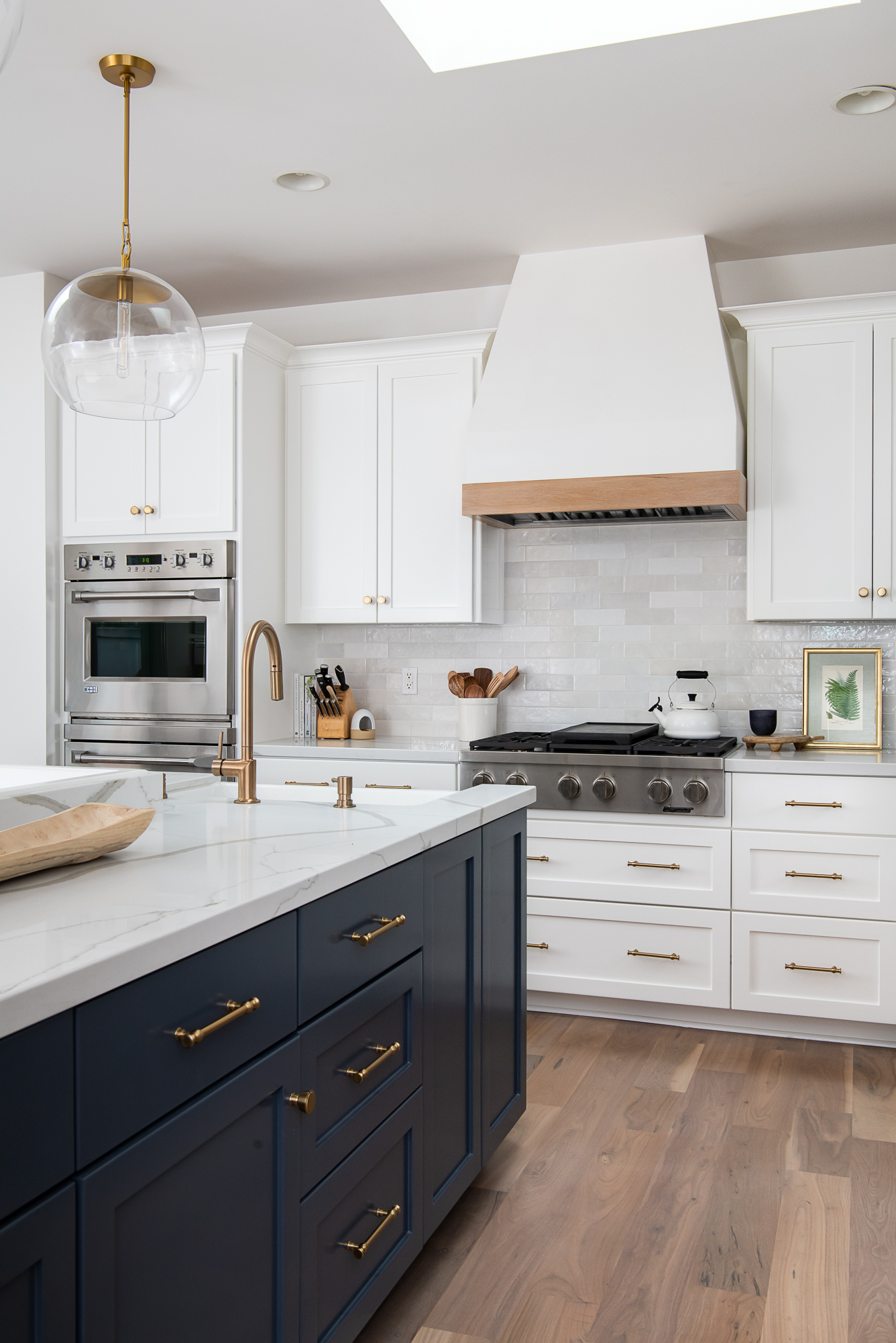 newly-painted-cabinets-quartz-countertops