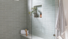 polished-nickel-shower-trim-moon-shower-tiles