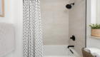 waterproof-tub-shower-combo-norge-stone-ivory-textured-shower-wall-tile