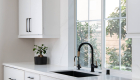 pull-down-faucet-with-arc-spout-and-knurled-handle-in-matte-black-and-luxe-gold