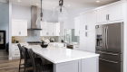 two-pendant-lights-sit-beautifully-above-the-kitchen-island
