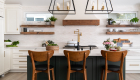 kitchen-island-seating-for-three-with-pull-down-kitchen-faucet-in-matte-black-with-moderne-brass