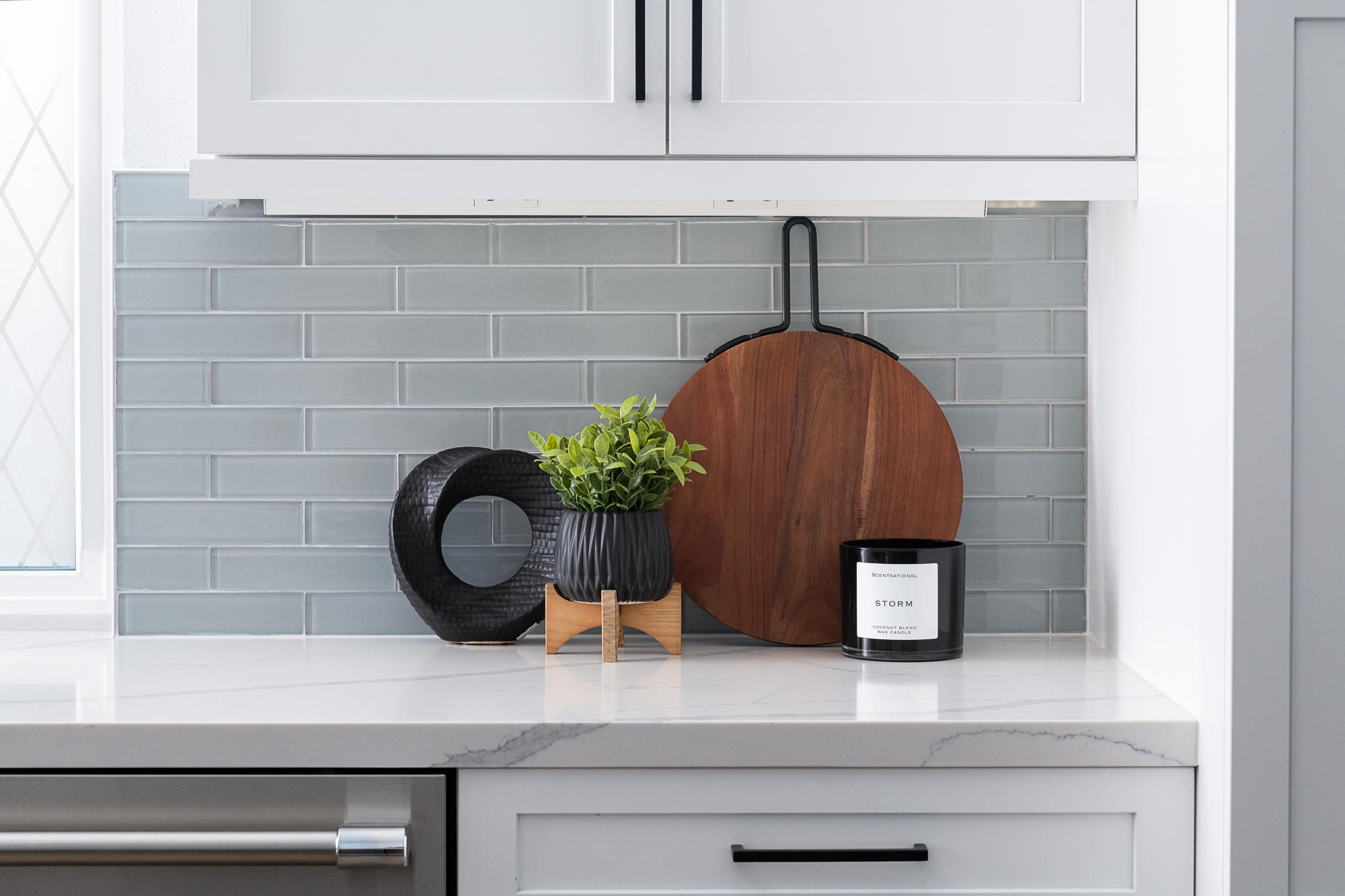 Sessemo-glossy-subway-glass-tile-in-ice-gray-painted-glass-tile-under-cabinet-lights-and-plugs