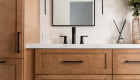 wall-sconces-and-pulls-in-matte-black-above-floating-cabinets