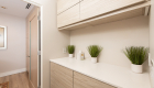20-custom-kitchen-craft-hallway-cabinets-Summit-Acrylic-Wood-Wired-Mercury-finish-Corterra-solid-surface-whitequartz-countertop