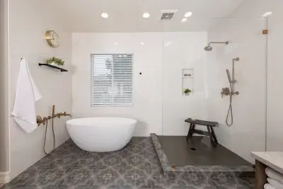 Innovative bathroom remodeling design includes a freestanding tub for an at-home spa.
