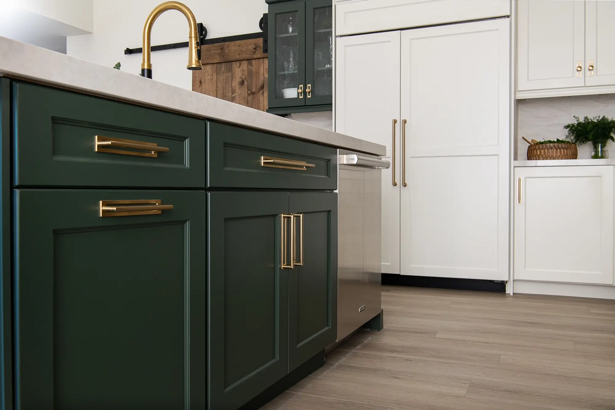 This kitchen renovation features plenty of kitchen storage near the sink zone