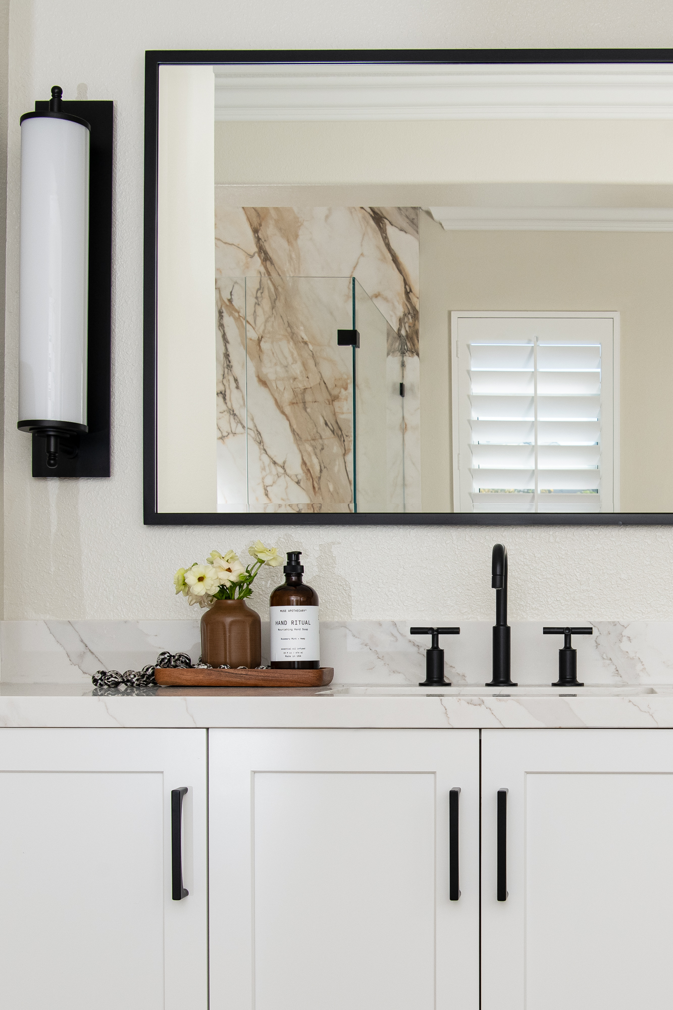 Kohler-Purist-widespread-faucet-with-cross-handles-matte-black