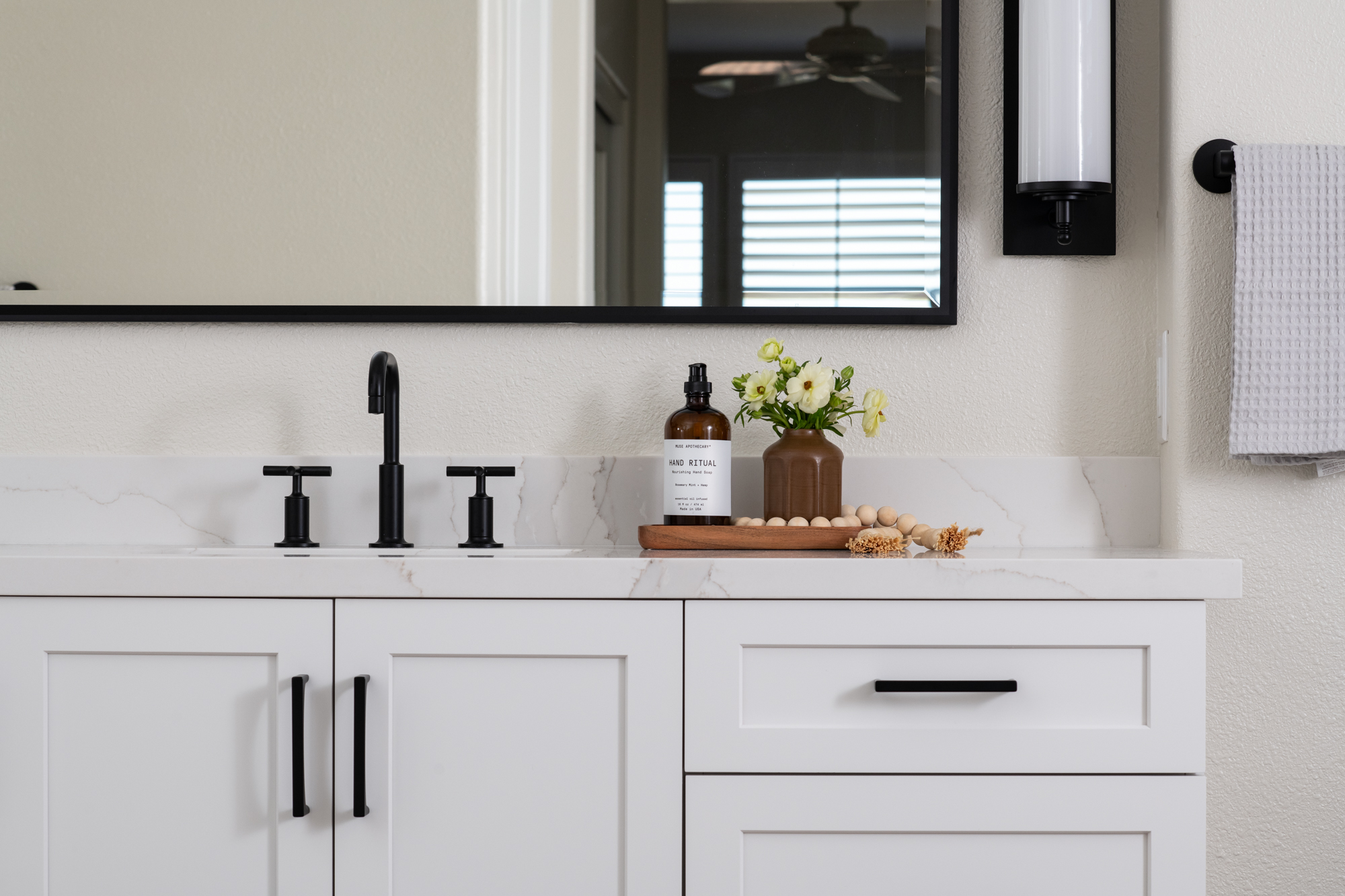 undermount-sink-doublewide-mirror-scroll-shaped-vanity-light-matte-black-and-white