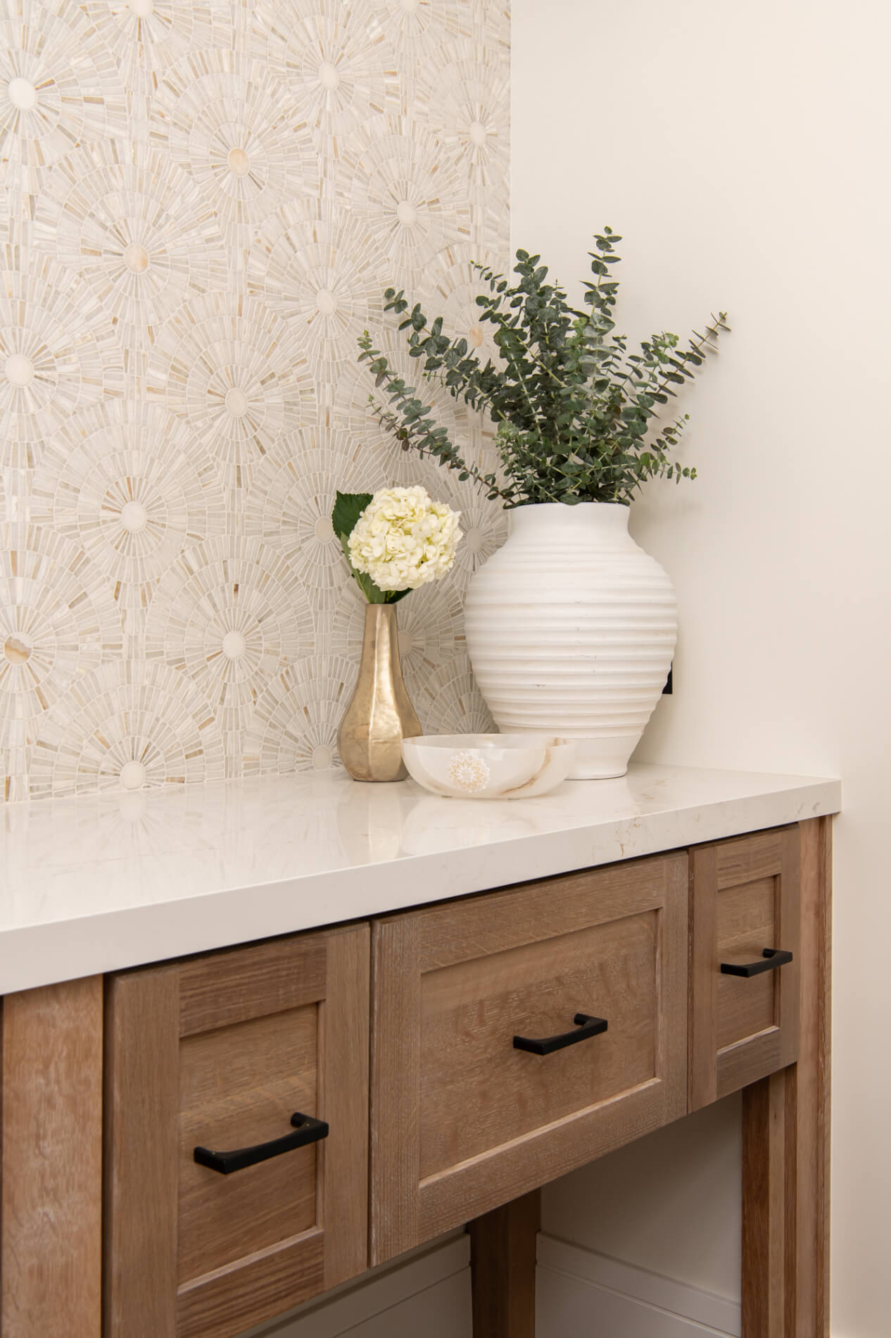 Omega-white-oak-cabinets-in-Ceruse-Natural-finish