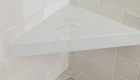 linear-shower-drain-in-Blanco-porcelain-2x2-tile-flooring