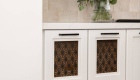 custom-decorative-powder-coated-metal-screens-on-lower-cabinetry