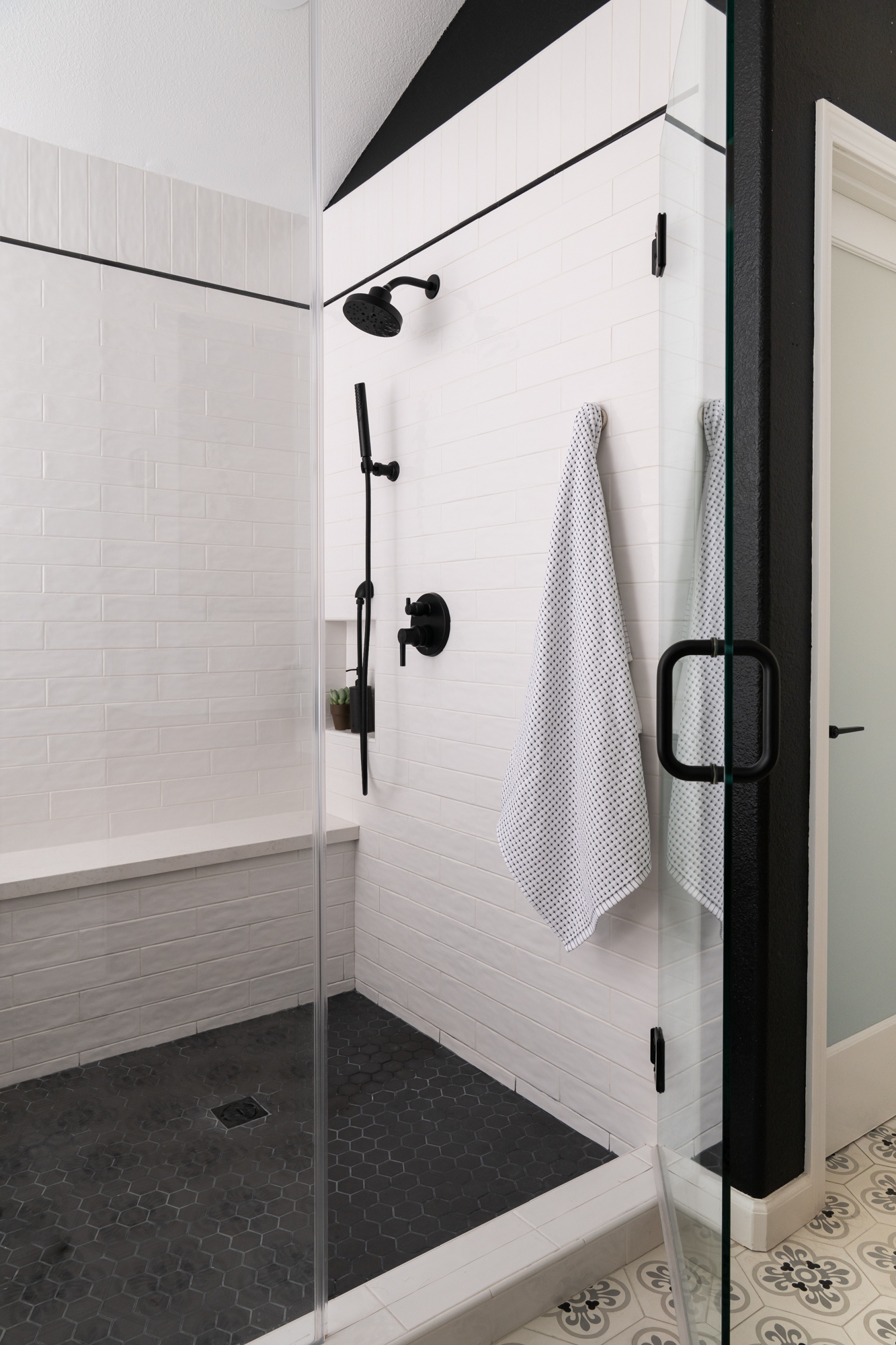 Pan-tile-Emser-porcelain-hex-mosaic-tiles-in-black-with-charcoal-grout