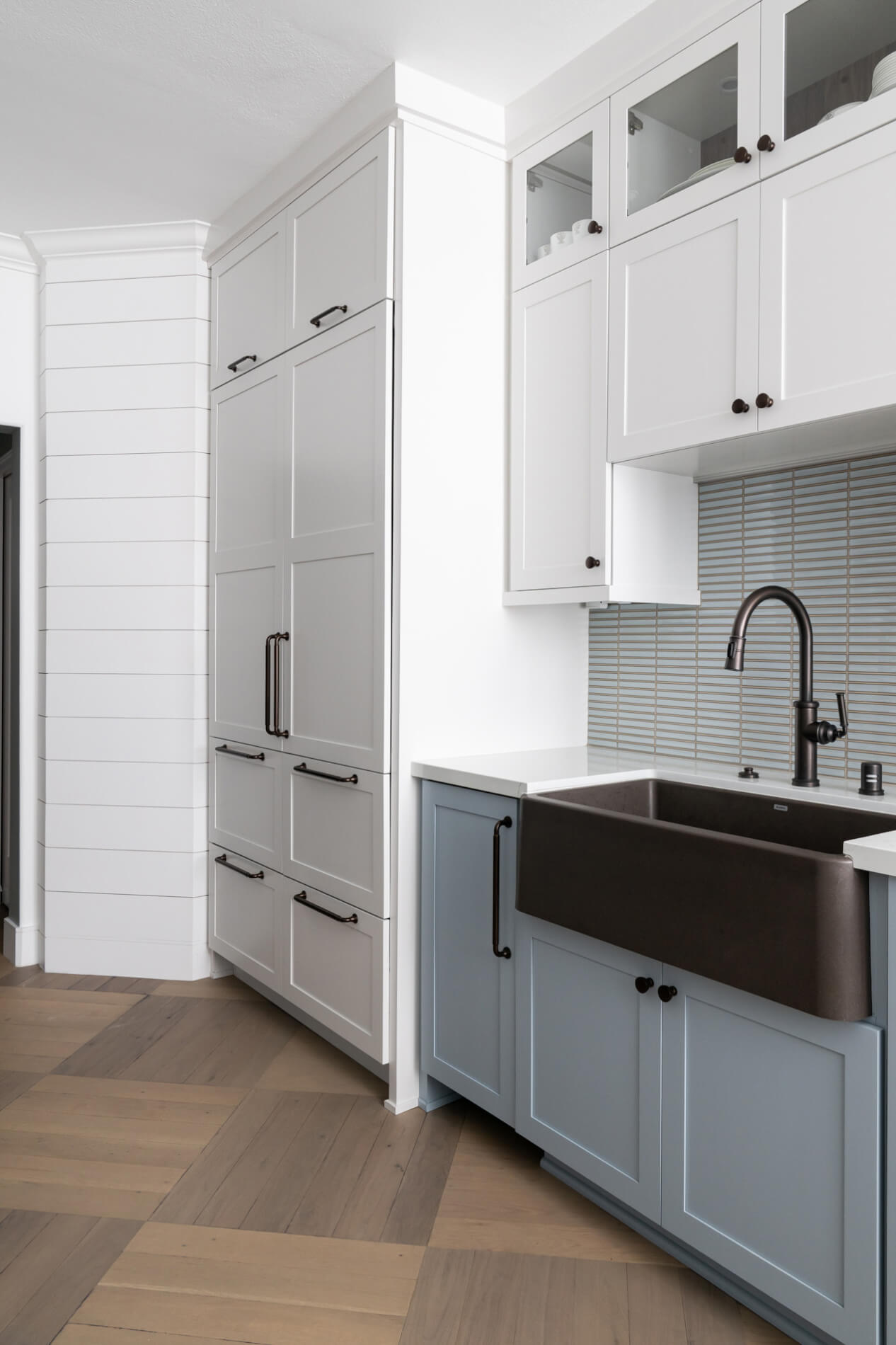 Blanco-Silgranit-33-Ikon-Farmhouse-Kitchen-Sink-in-Cafe-with-Pull-Down-Kitchen-Faucet-and-cold-water-faucet-in-English-Bronze