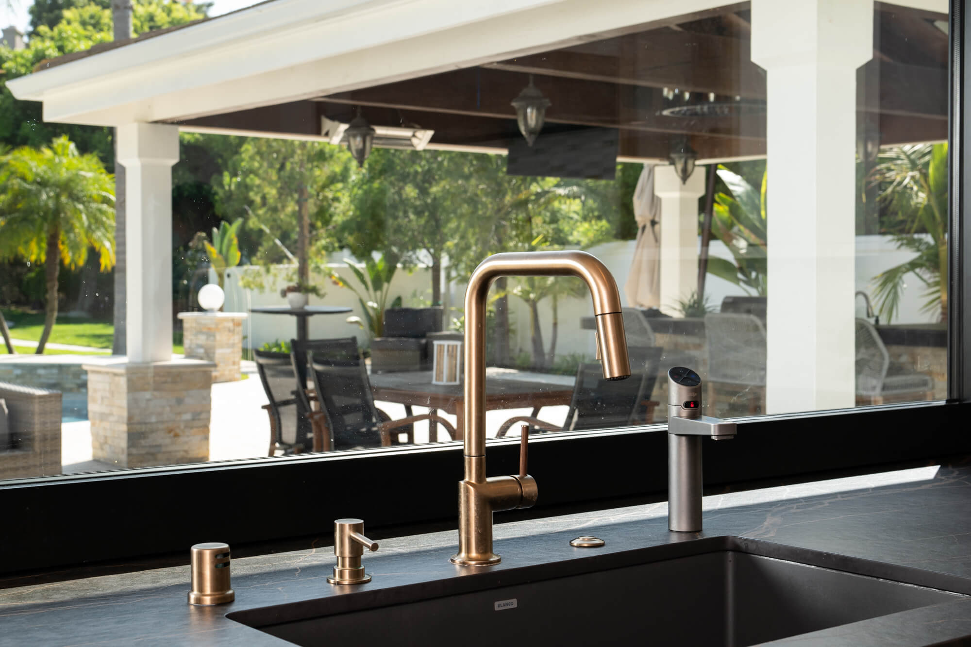 Brizo-Odin-pull-Down-faucet-with-square-spout-soap-dispenser-and-air-gap-in-luxe-gold