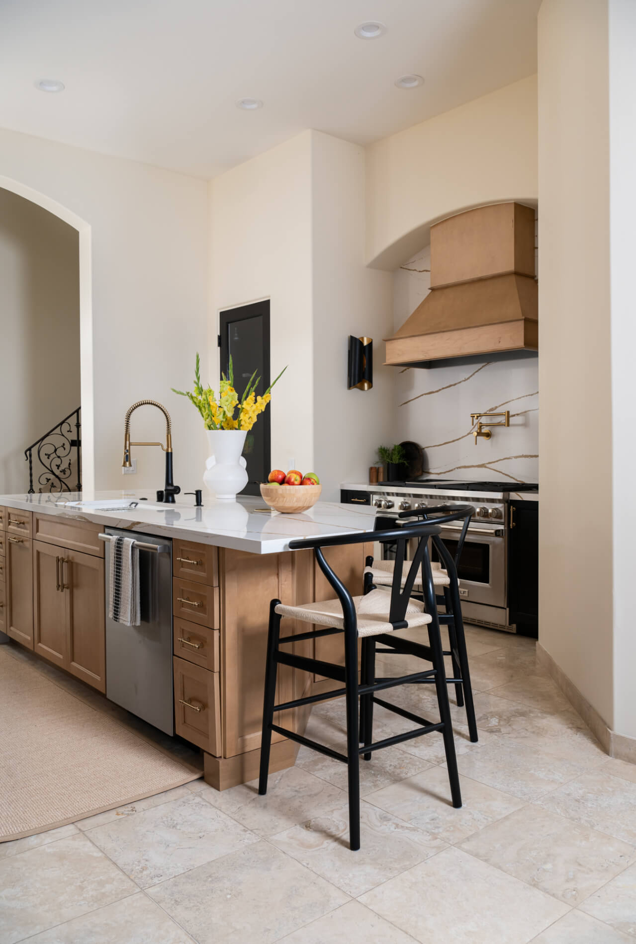 custom-wall-mounted-hood-by-Waypoint-in-Rye-finish-within-an-arched-alcove