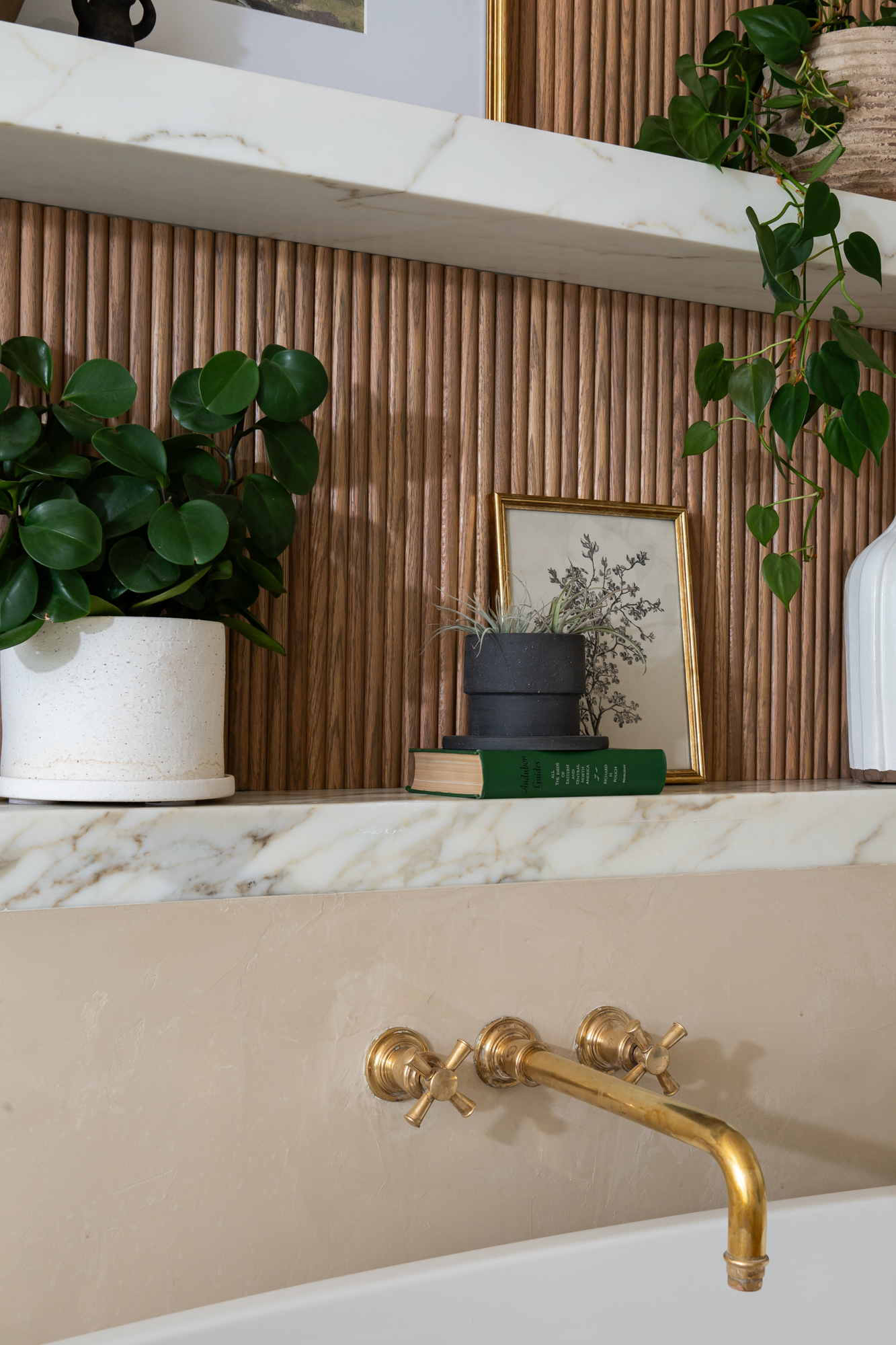 decorative-wooden-paneling-above-soaking-tub-adds-texture