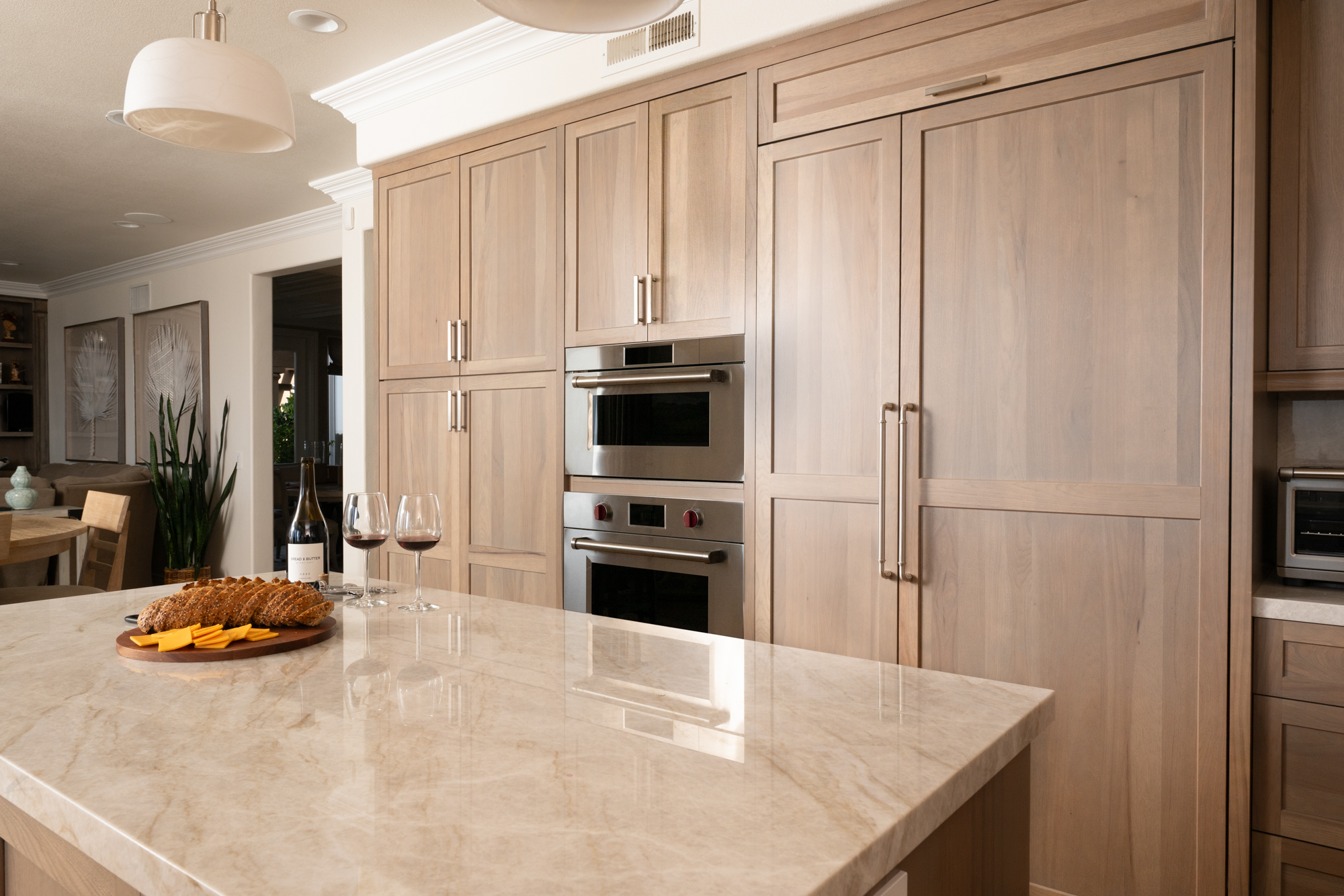 Paneled-Fridge-with-brushed-satin-nickel-pulls-integrated-into-the-cabinetry