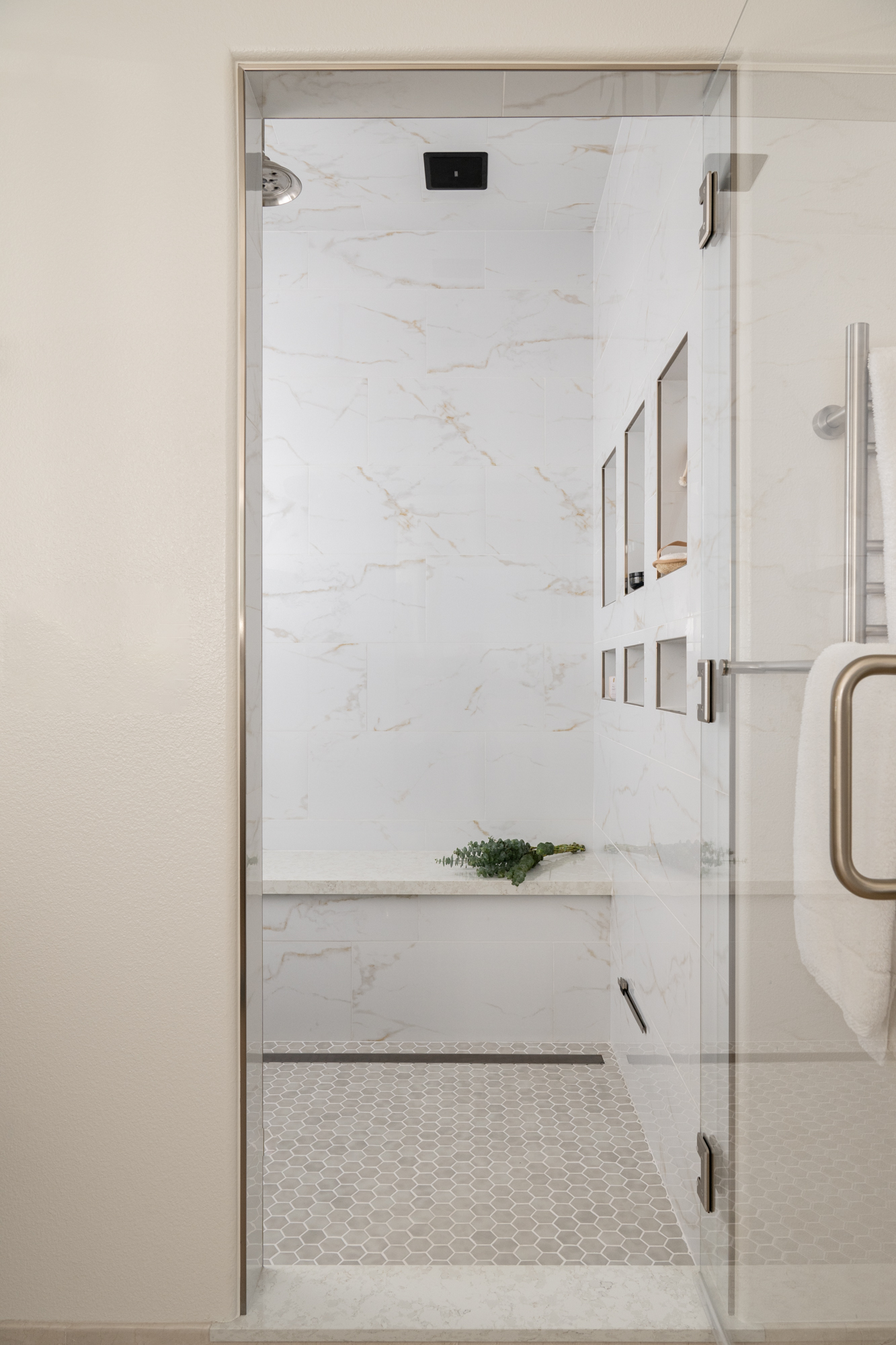 custom-shower-glass-door-with-brushed-nickel-towel-bar-handle