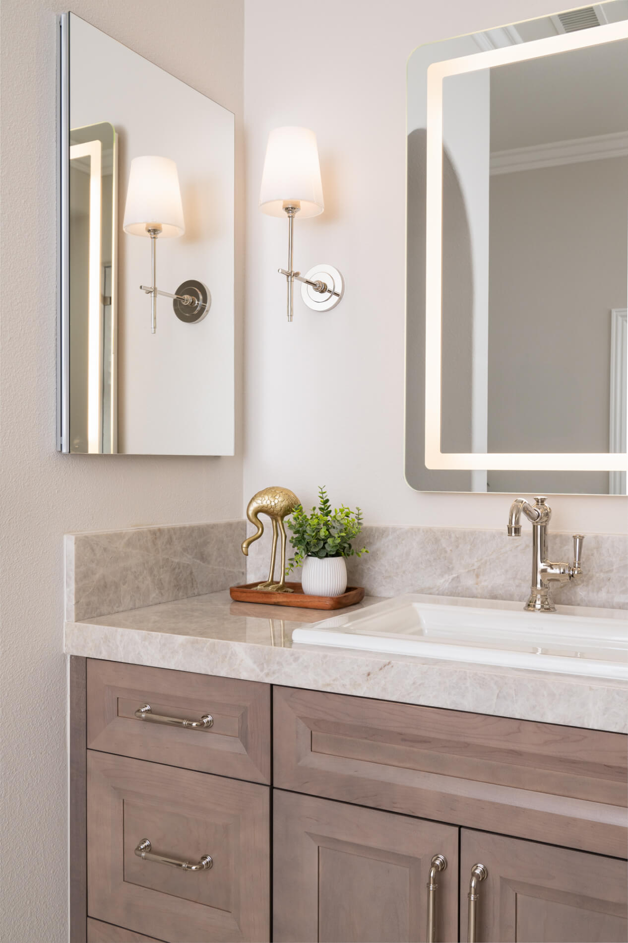 Quartzite-countertops-and-backsplash-in-a-polished-Taj-Mahal-finish