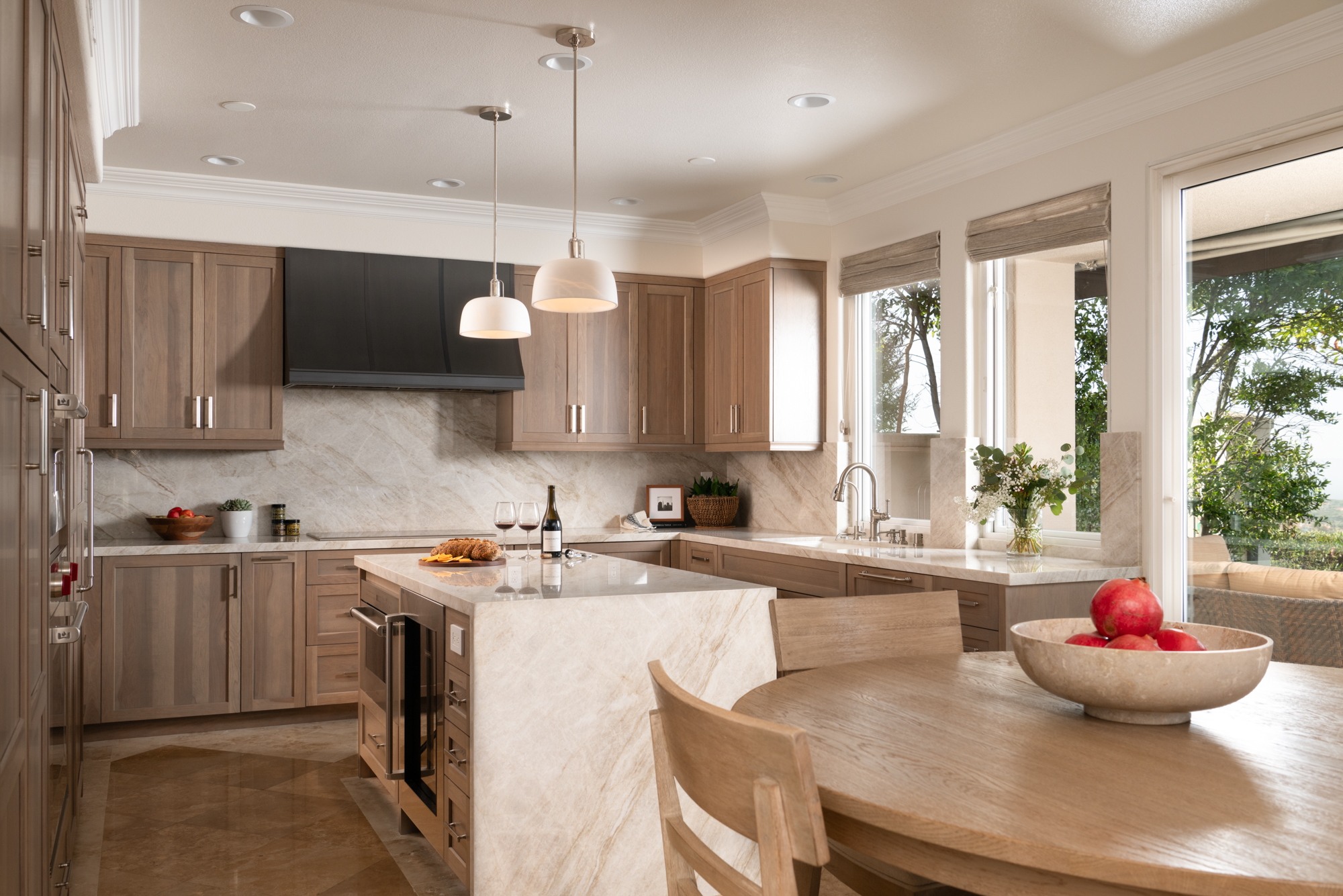 two-dome-pendant-light-in-alabaster-and-polished-nickel-over-island