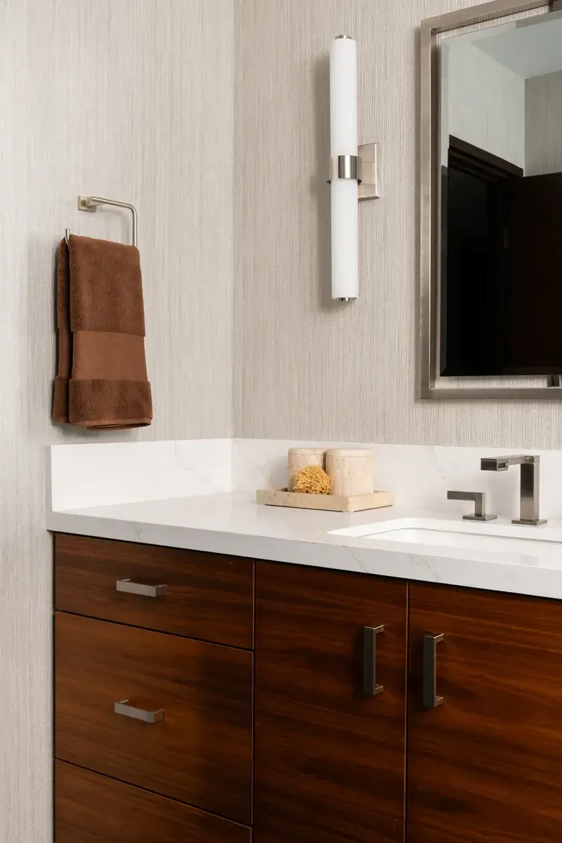 Sea-Pointe-Design-And-Remodel-brushed-nickel-double-framed-rectangulat-vanity-mirror-and-brushed-nickel-vanity-light-with-white-bulb-casing