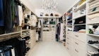 sea-pointe-design-and-remodel-walk-in-closet-extension-with chandelier