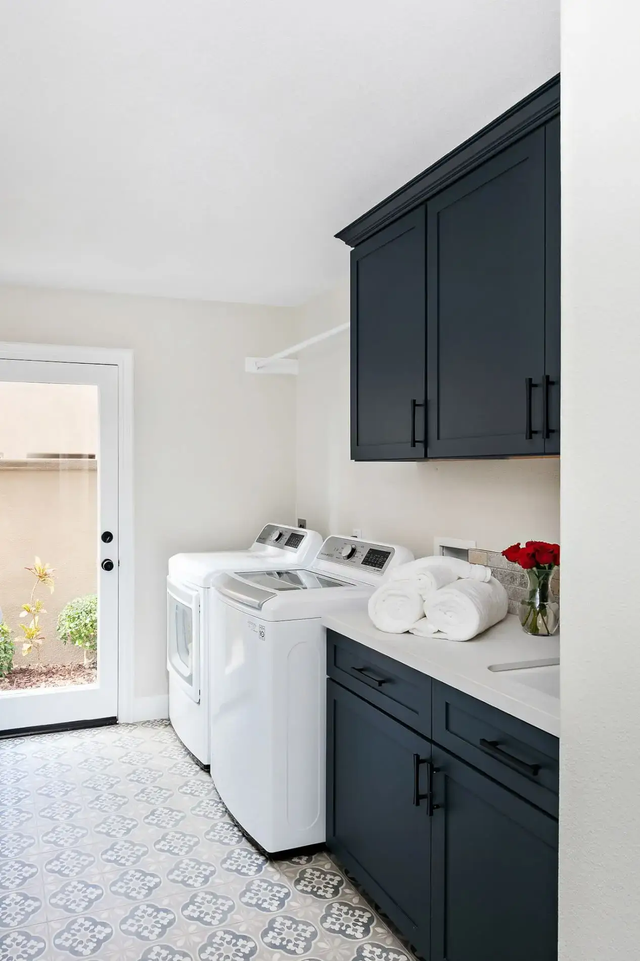 Laundry-room-remodel-with-patterned-porcelain-flooring