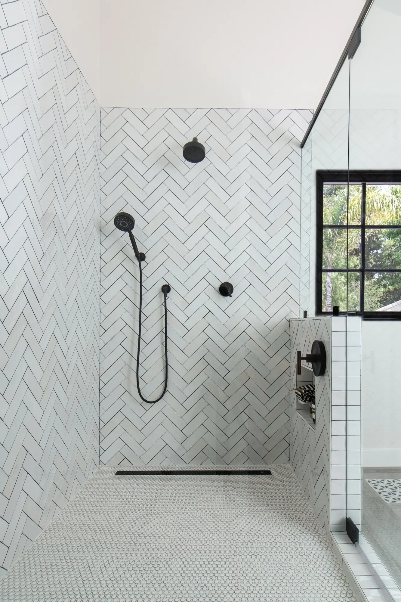Large Walk in Shower Remodel With Herringbone Tile and Linear Drain