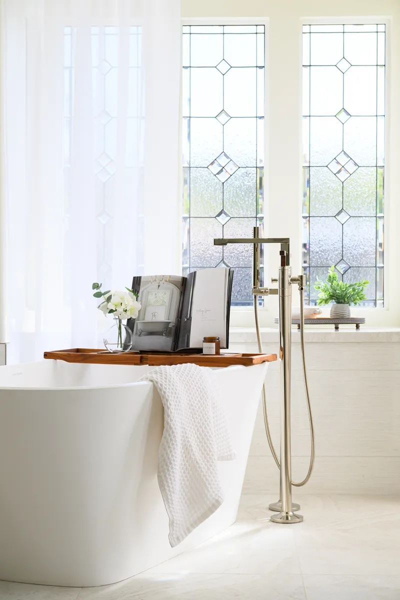 polished-nickel-and-wood-floor-mounted-tub-filler-with-shower-wand