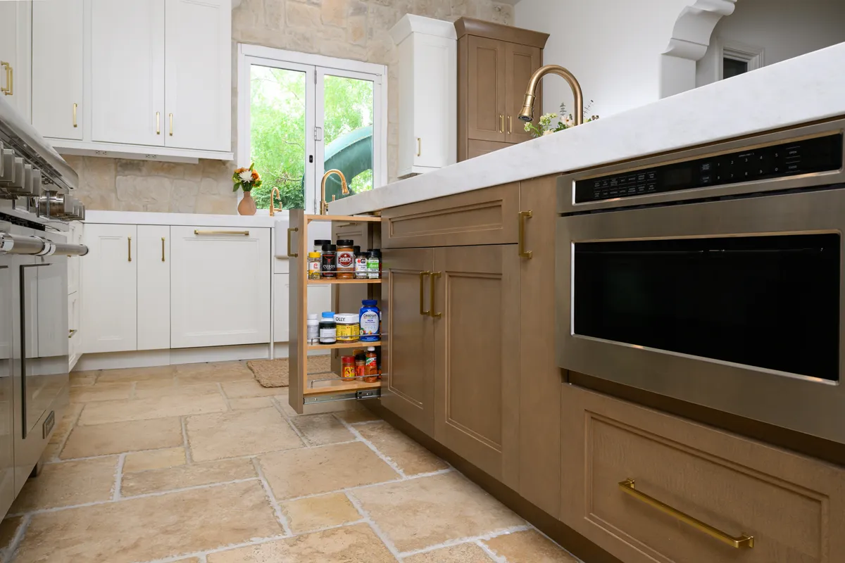 island-includes-custom-pull-out-cabinetry-and-built-in-microwave