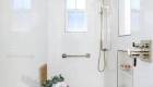 porcelain-shower-wall-in-Brunei-series-with-polished-blanco-finish-shower-floor-Pan-Am-Stream-Bone-Mosaic-in-Bone-matte