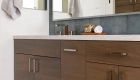 two-separate-vanities-each-include-white-undermount-sinks