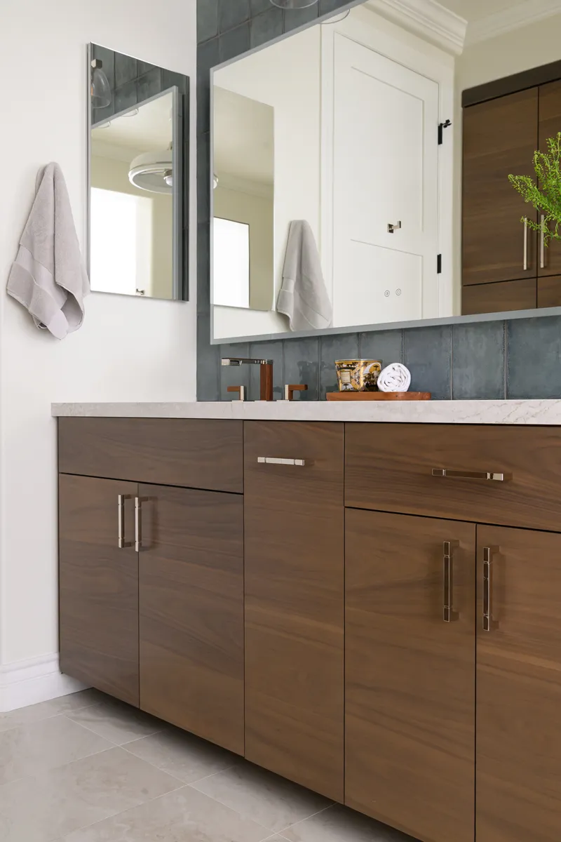 two-separate-vanities-each-include-white-undermount-sinks