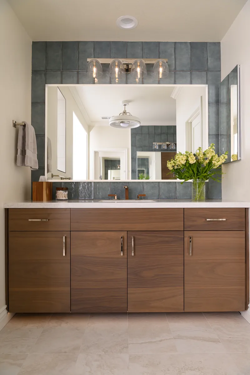 His-and-hers-Omega-vanity-and-storage-cabinets-in-walnut-with-Riverbed-finish